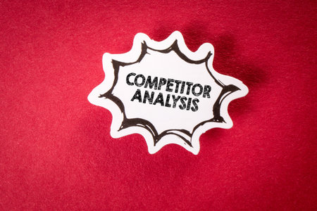 COMPETITOR ANALYSIS. Speech bubble on red backgroundの写真素材