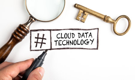 Cloud Data Technology. Golden key and magnifying glass on white background