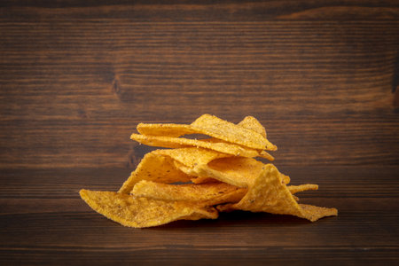 Corn chips nachos on wood texture backgroundの写真素材