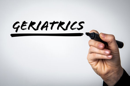 Geriatrics. Text written with a black marker on a white backgroundの写真素材