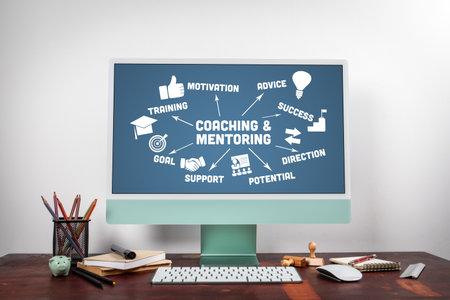 Coaching and Mentoring Concept. Chart with keywords and icons. Computer on the office tableの写真素材