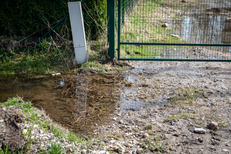 Rains and floods. Flooded urban area. Sewage systemsの写真素材