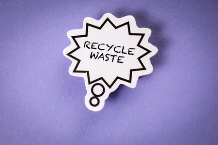 Recycle Waste. Speech bubble with text on a purple backgroundの写真素材