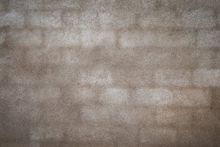 Wet brick wall of a house. Cement plasterの写真素材