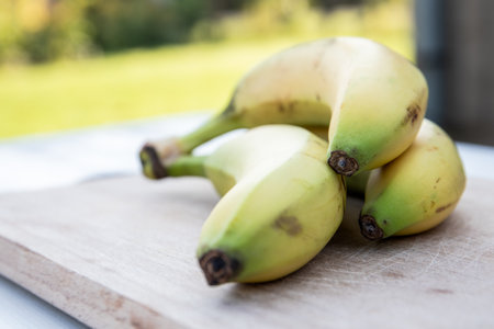Bananas on a wooden board. Healthy eating and dietの写真素材