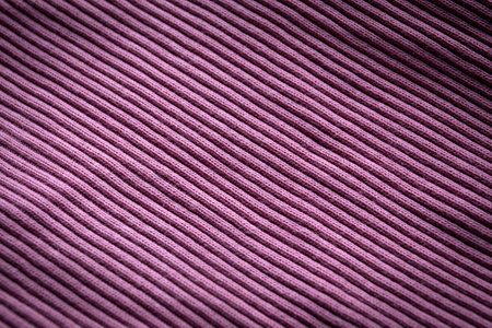Purple knit close-up, ribbed, distinct texture. Abstract backgroundの写真素材