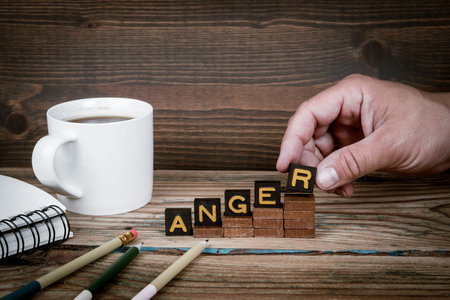 Old letter tiles on wooden steps, development conceptの写真素材
