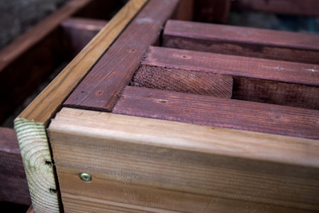 Wooden construction for terrace, planks, screws and piles