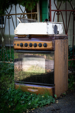 Used household appliances. Gas stove and hoodの写真素材