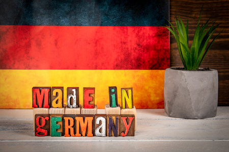 Made in Germany. Alphabet blocks on a white painted wooden backgroundの写真素材