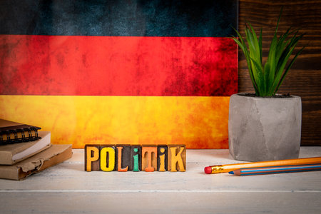 Text in German. Alphabet blocks on a white painted wooden backgroundの写真素材