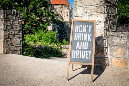 Dont Drink And Drive. Chalkboard advertising sign in an urban environmentの写真素材