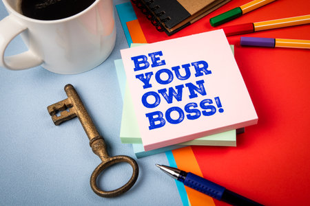 BE YOUR OWN BOSS. Office Supplies, Coffee, and Vintage Key on Colorful Backgroundの写真素材