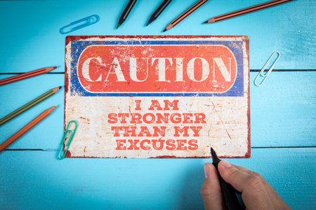 I AM STRONGER THAN MY EXCUSES. Motivational Quote Sign on Blue Background