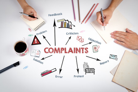 COMPLAINTS Concept. The meeting at the white office tableの写真素材