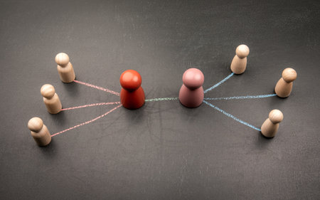 Illustration of two group leaders forming connections with their teams using chalk arrowsの写真素材