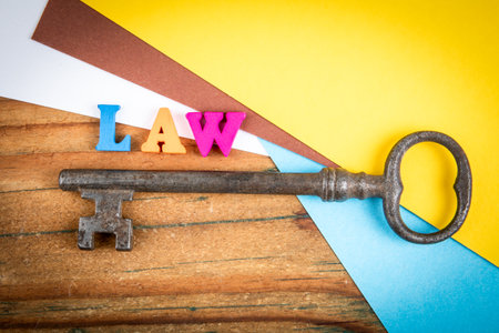 Key to understanding justice and law concept with colorful backgroundの写真素材