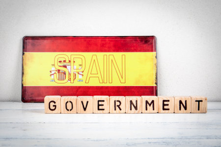 Spain national government authority concept with text and flag backgroundの写真素材