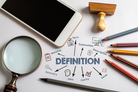 DEFINITION concept. Chart and illustration on a white office deskの写真素材