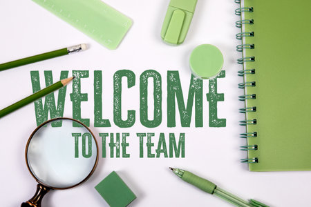 Welcome to the Team Message Surrounded by Office Supplies Representing New Employee Onboarding and Teamwork Conceptの写真素材
