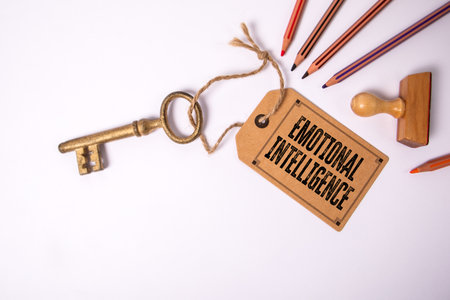 Key with Tag Labeled Emotional Intelligence Concept on White Background Representing Leadership and Self Awarenessの写真素材