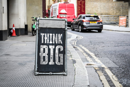 Think Big Motivational Sign on Urban Streetの写真素材