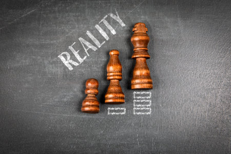 REALITY Concept Illustrated With Chess Pieces And Career Progression Levels