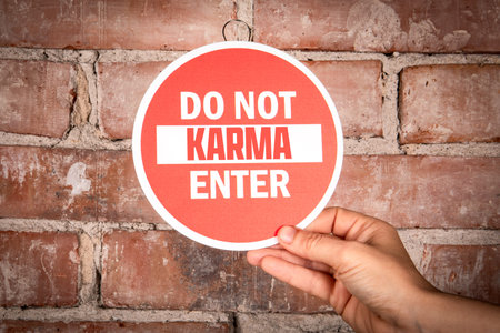 Do Not Karma Enter Warning Concept With Red Sign On Brick Wallの写真素材