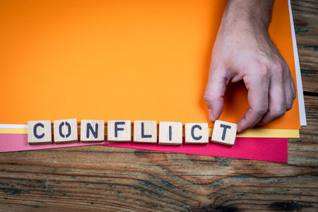 CONFLICT Social And Political Tension Concept Shown With Wooden Letter Blocks