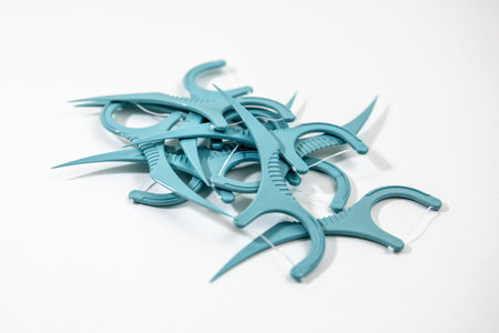 Pile Of Dental Floss Picks Closeup Isolated On White Background