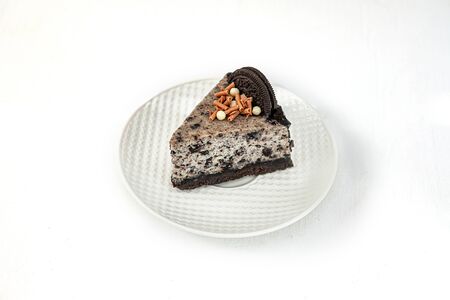 Cookies and cream brownies with topping made from Oreo cookies.
