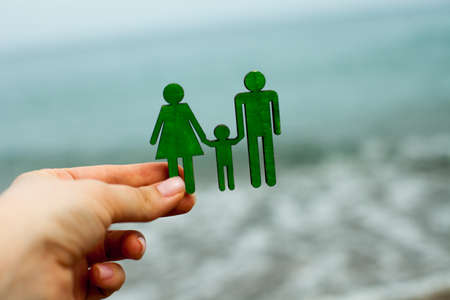 the concept of planning a vacation and rest for seven with a child and life and health insurance of...