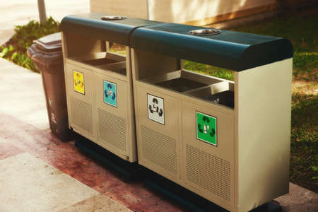 monsoon containers on the street. Sorting the garbage. Plastic, metal and paper. Close-up photos, street trash separate.の写真素材