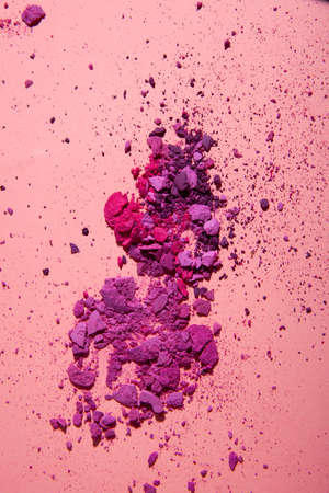 crushed powder eyeshadow makeup set isolated on pink background.の写真素材