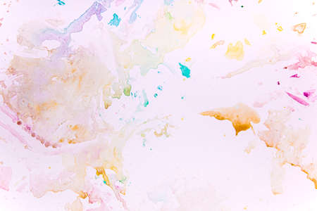 watercolor spots of yellow and blue on a white background. texture. bright spots and splashes of...