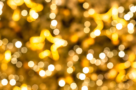 blurred yellow color of star bokeh background.