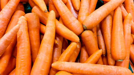 orange color of carrot on shelf for sell in supermarket