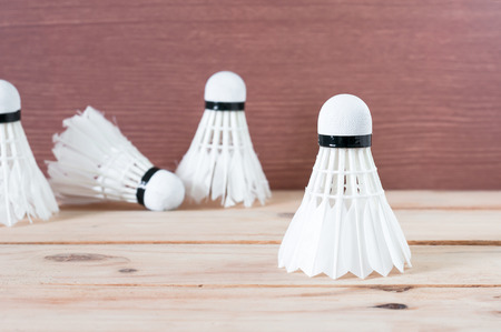 BADMINTON white Shuttlecock on nature wooden backgroundの写真素材