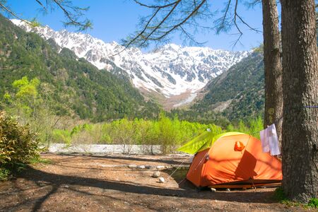 Tent with a view of japan alps mountain, Japanの写真素材