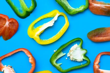 Summer of slice sweet bell pepper on blue backgroundの写真素材