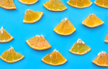 Summer of slice orange fruit on blue background