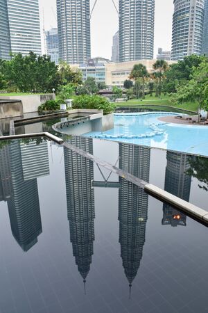 Kuala Lumpur, Malaysia-March 20: Petronas Twin Towers in reflection from the park on March 20, 2016 at Kuala Lumpur , Malaysiaのeditorial素材