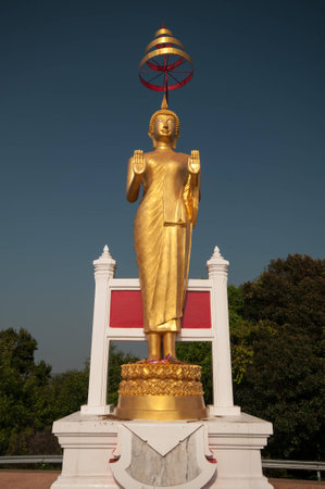 Golden Buddha with blue skyの写真素材