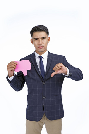 Asian young handsome business man isolated on white background with copy spaceの写真素材
