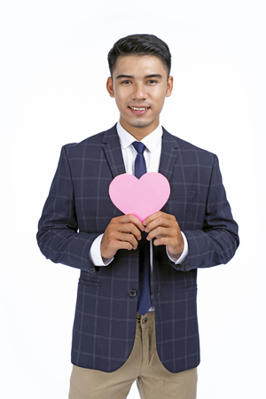 Asian young handsome business man isolated on white background with copy spaceの写真素材
