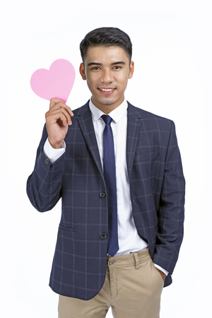 Asian young handsome business man isolated on white background with copy spaceの写真素材