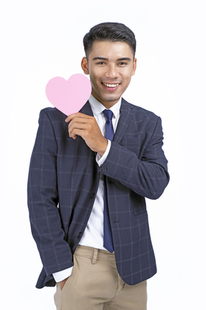 Asian young handsome business man isolated on white background with copy spaceの写真素材