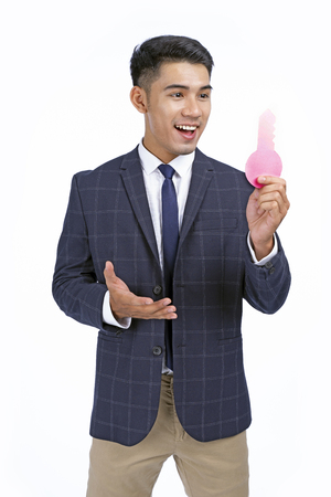 Asian young handsome business man isolated on white background with copy spaceの写真素材