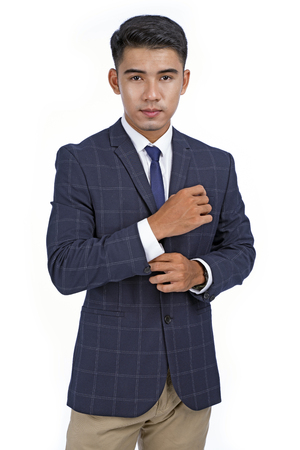 Asian handsome young business man isolated on white background with copy spaceの写真素材