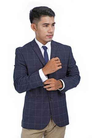 Asian handsome young business man isolated on white background with copy spaceの写真素材